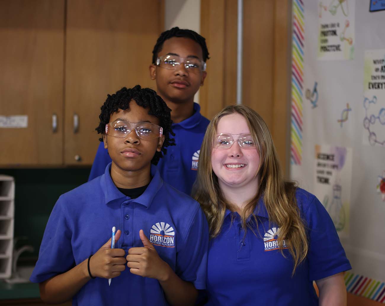 Teacher or school staff member warmly interacting with a student outside